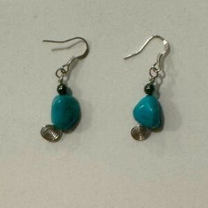 New handmade turquoise like rocks, hematite with spirals at the bottom